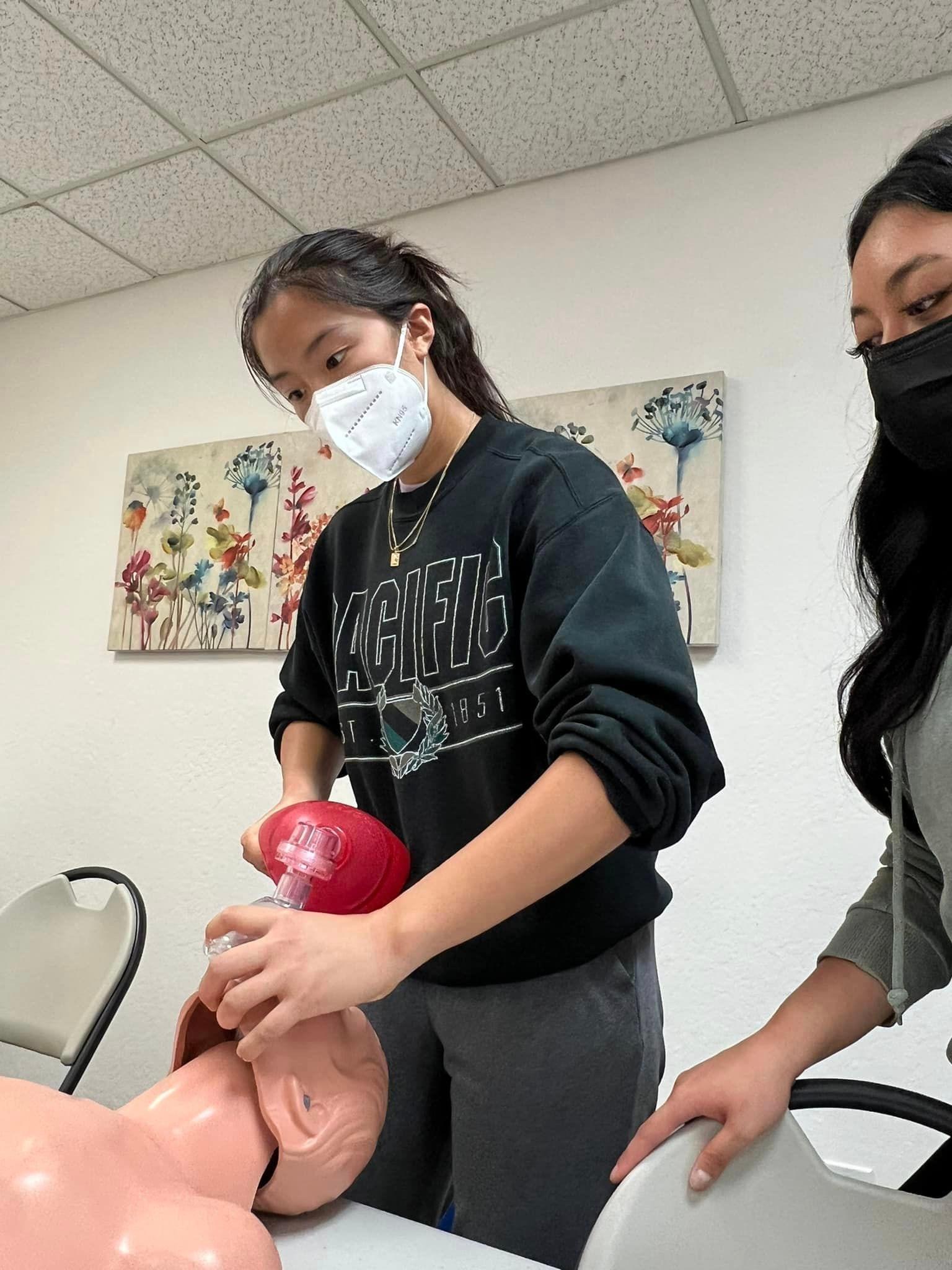cna student practices cpr